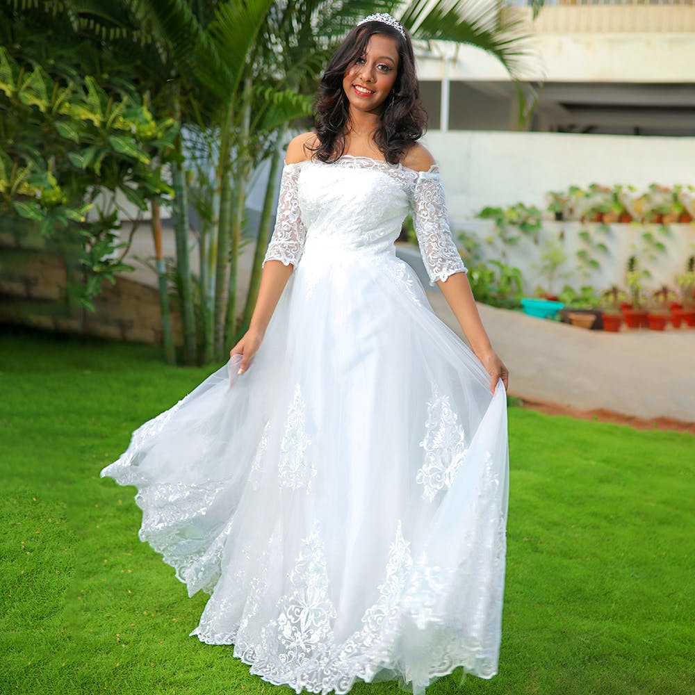 Gown,Clothing,Dress,Wedding dress,White,Shoulder,Bridal party dress,Bridal clothing,Photograph,Lady