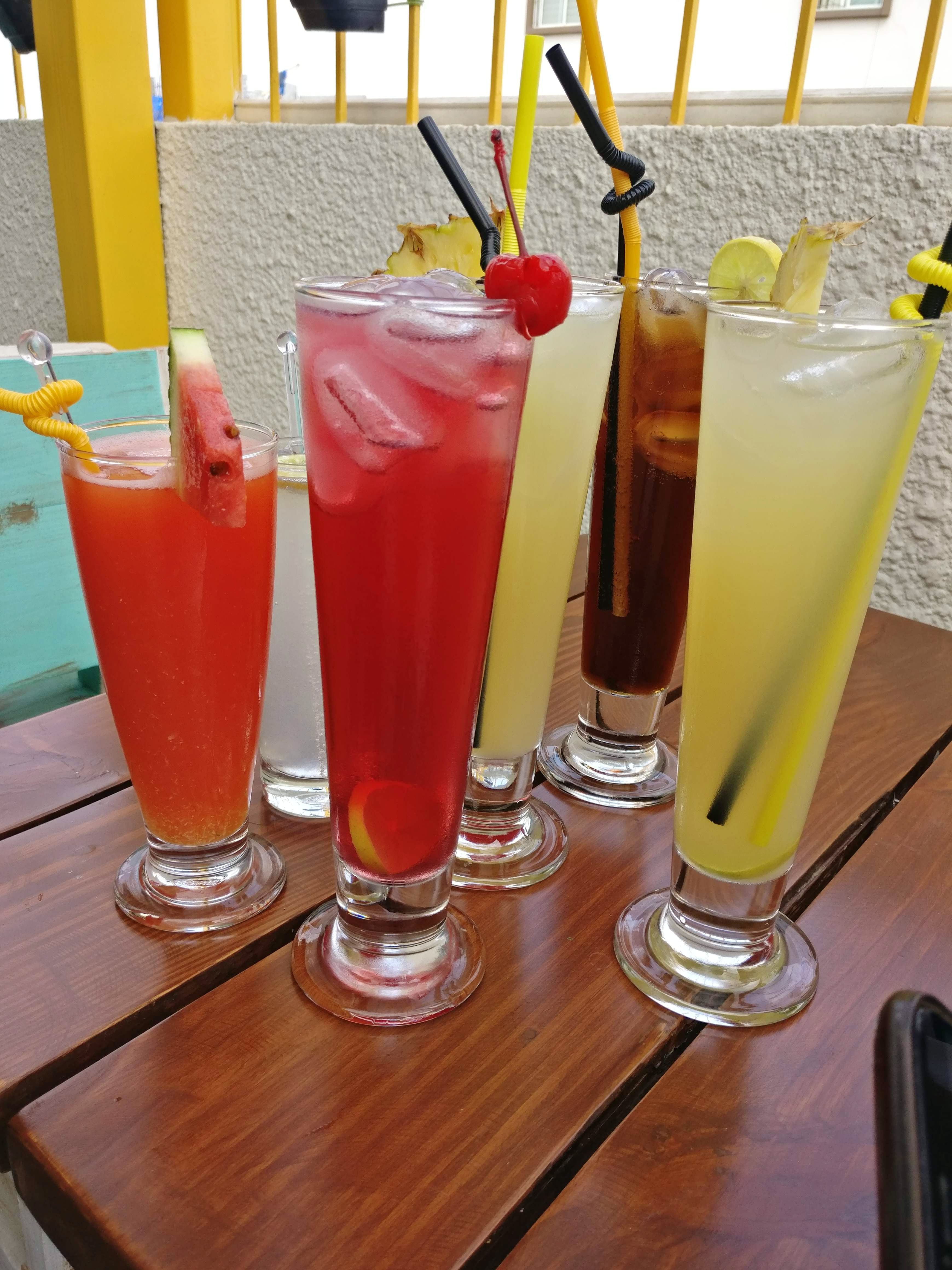 Drink,Juice,Cocktail garnish,Bay breeze,Non-alcoholic beverage,Distilled beverage,Alcoholic beverage,Rum swizzle,Cocktail,Woo woo