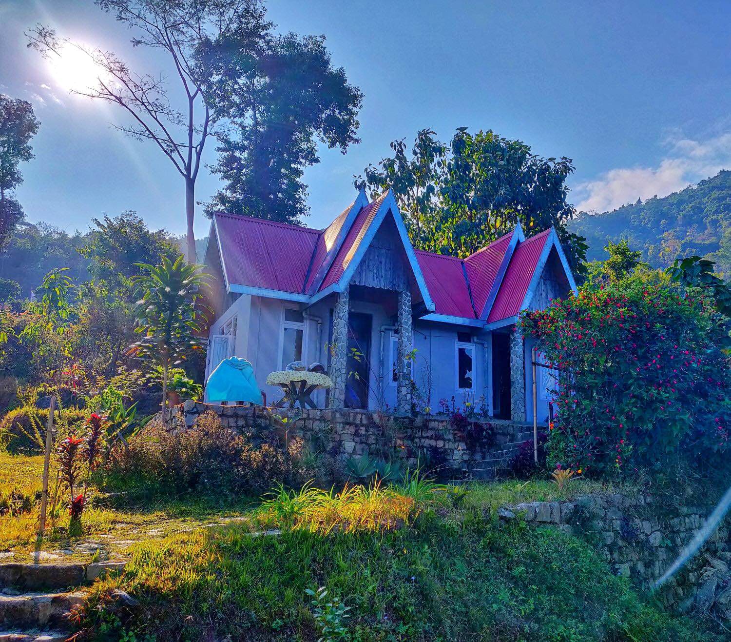 House,Home,Sky,Blue,Property,Natural landscape,Tree,Architecture,Building,Hill station