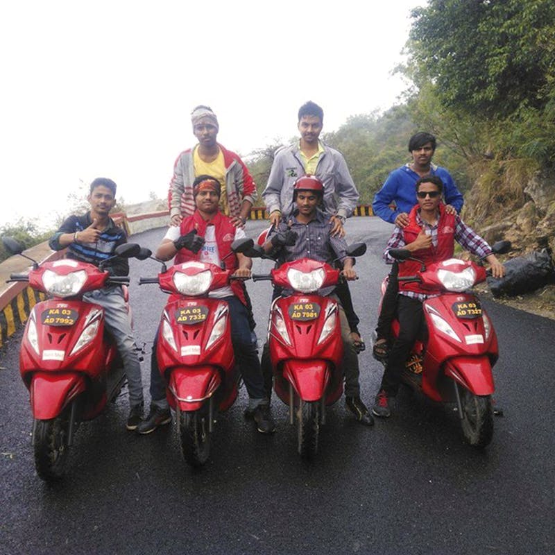 Motor vehicle,Vehicle,Scooter,Mode of transport,Transport,Motorcycle,Automotive wheel system,Team,Wheel,Adventure