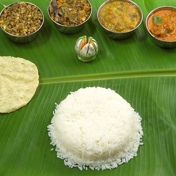 Dish,Food,Cuisine,Ingredient,Banana leaf rice,Andhra food,Steamed rice,Sadya,Tamil food,White rice