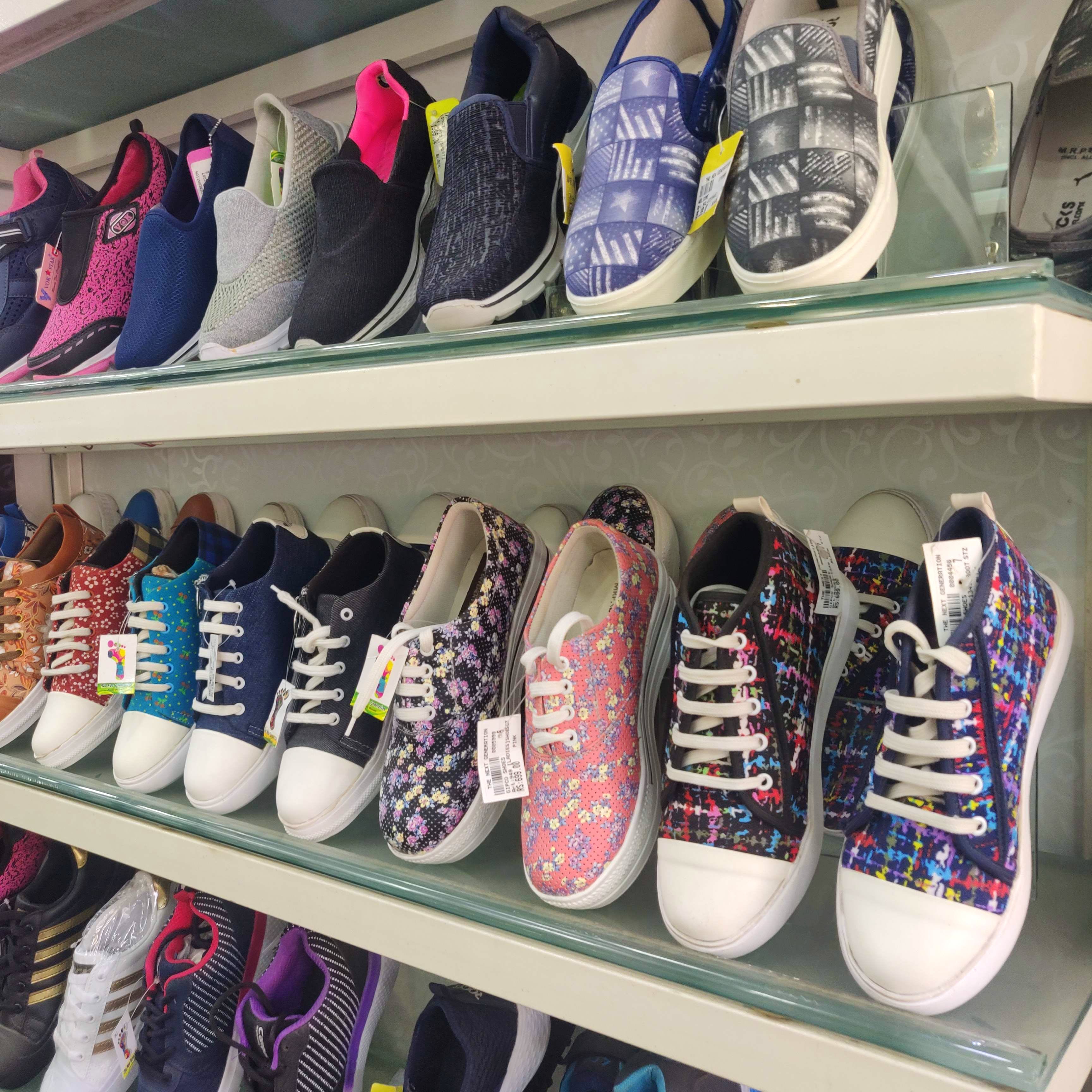 Footwear,Shoe,Plimsoll shoe,Fashion,Skate shoe,Collection,Athletic shoe,Sneakers,Shelf,Shoe store