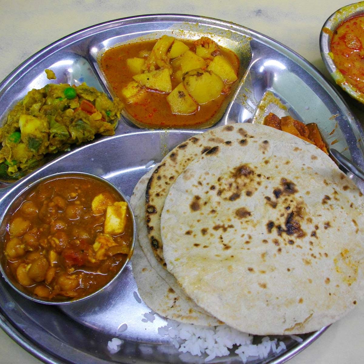 Dish,Food,Cuisine,Chapati,Ingredient,Roti,Naan,Punjabi cuisine,Maharashtrian cuisine,Paratha