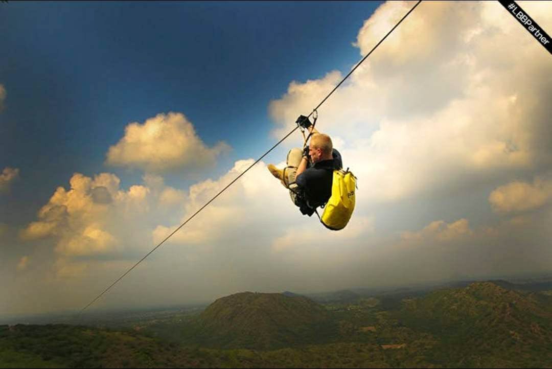 Extreme sport,Sky,Swing,Rope,Adventure,Recreation,Fun,Cloud,Leisure,Happy