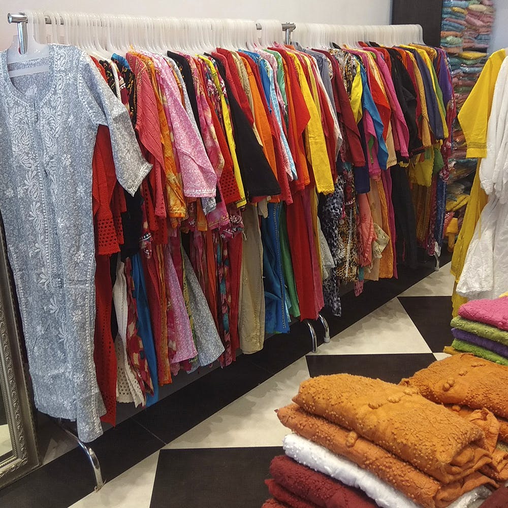 Boutique,Clothing,Room,Textile,Closet,Wool,Bazaar,Outerwear,Wardrobe,Linens