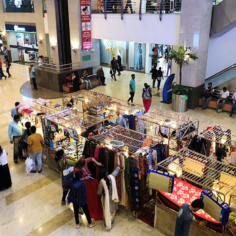 Shopping mall,Outlet store,Shopping,Building,Marketplace,Retail,Fashion,Footwear,Service,Bazaar