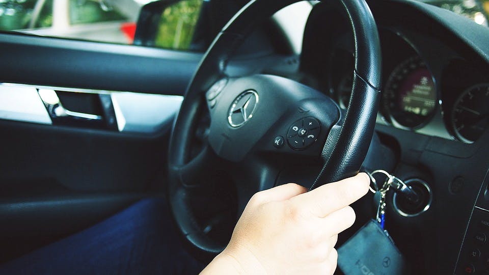 Steering part,Steering wheel,Vehicle,Car,Auto part,Vehicle door,Speedometer,Luxury vehicle,Automotive wheel system,Wheel