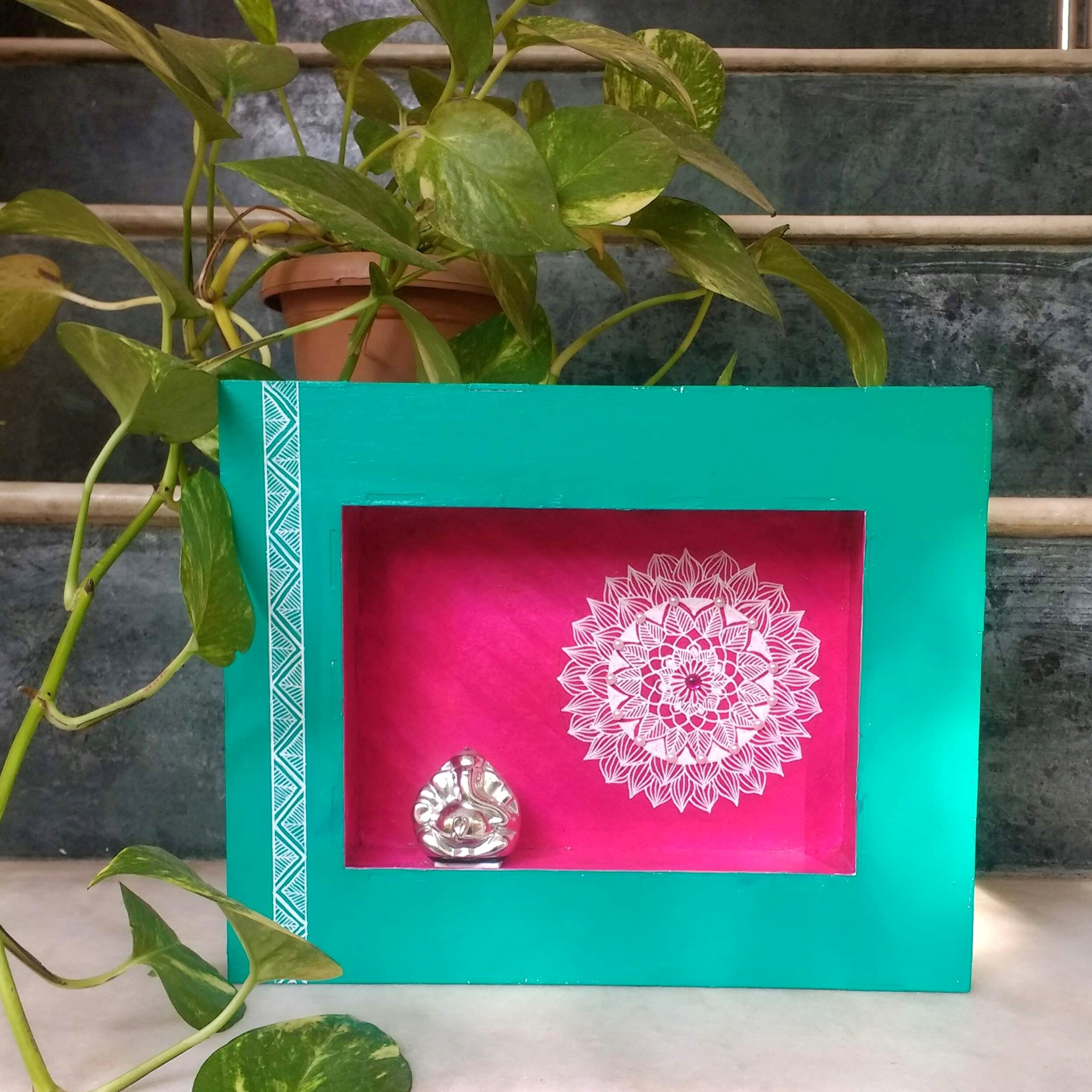 Green,Pink,Picture frame,Magenta,Leaf,Box,Rectangle,Textile,Plant,Visual arts