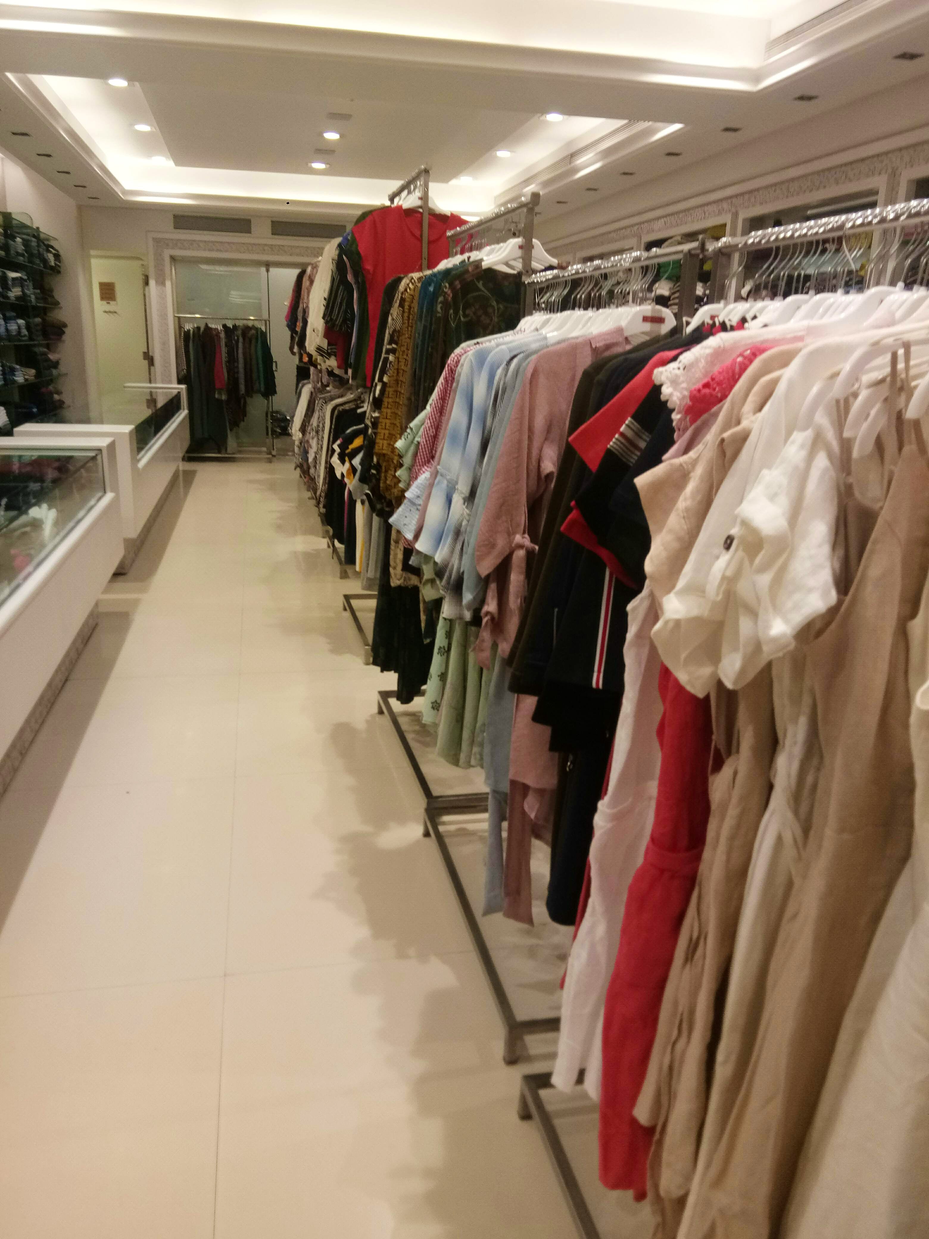 Boutique,Clothing,Outlet store,Closet,Room,Fashion,Aisle,Ceiling,Dress,Shopping