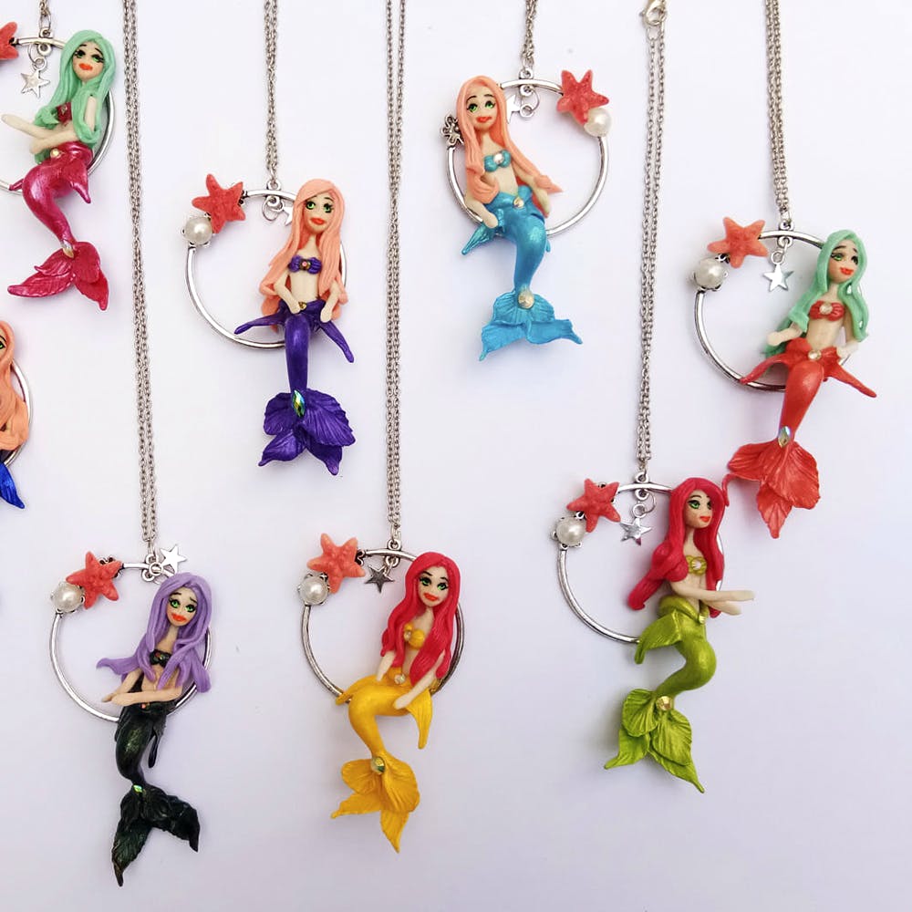 Jewellery,Fashion accessory,Necklace,Body jewelry,Chain,Mermaid,Fictional character,Parrot