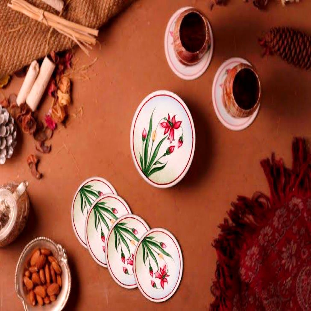 Leaf,Cup,Coffee cup,Tableware,Herb,Plant,Food,Cinnamon stick,Porcelain,Cuisine