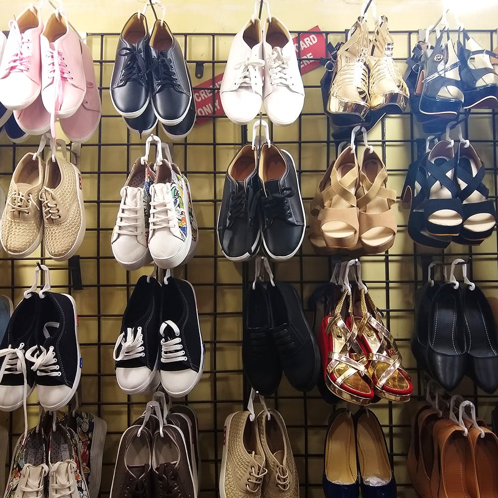 Footwear,Shoe,Fashion accessory,Collection,Shoe store,Horse tack,Metal,Handbag