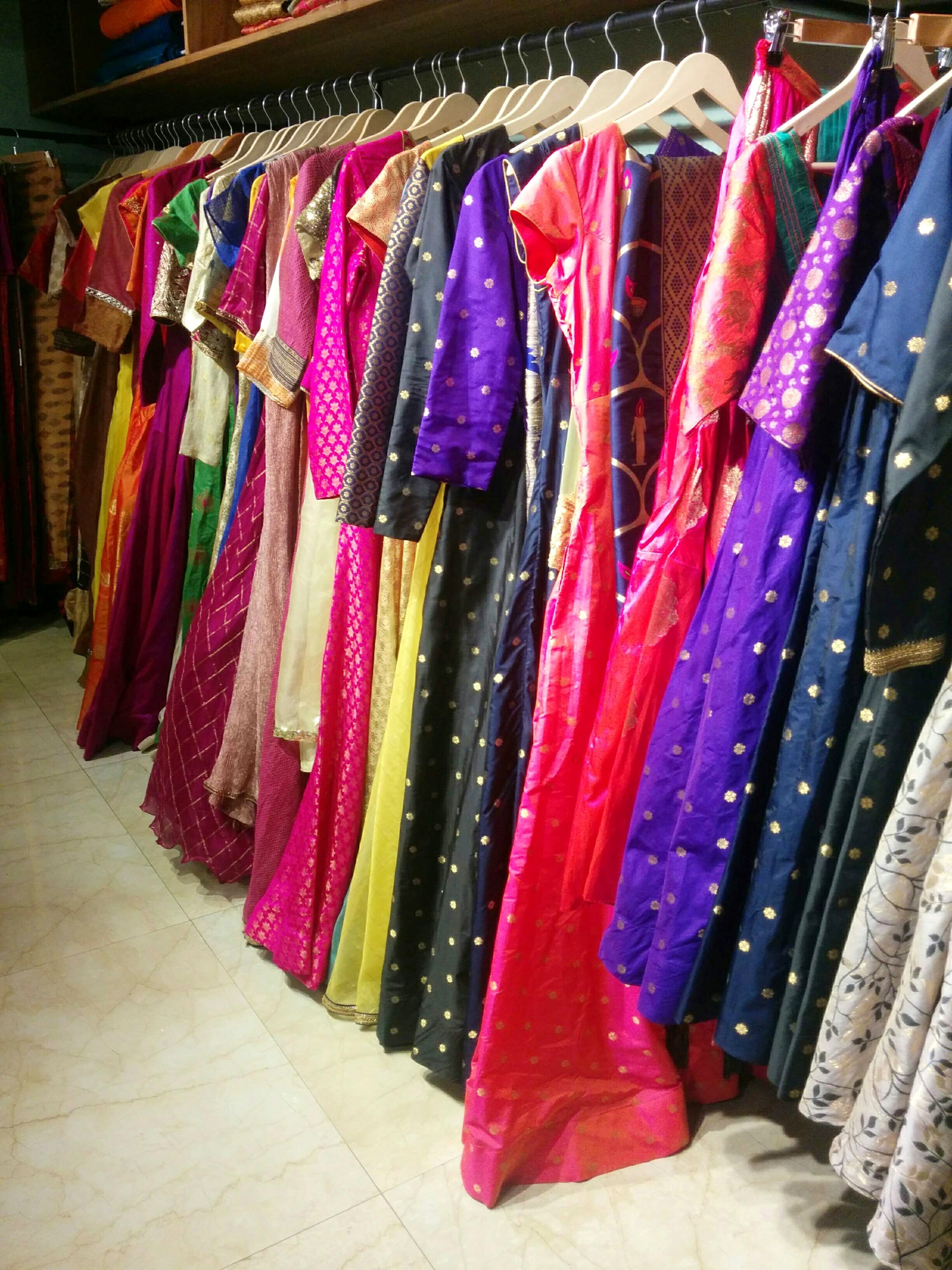 Clothing,Boutique,Room,Pink,Textile,Dress,Closet,Magenta,Furniture,Wardrobe