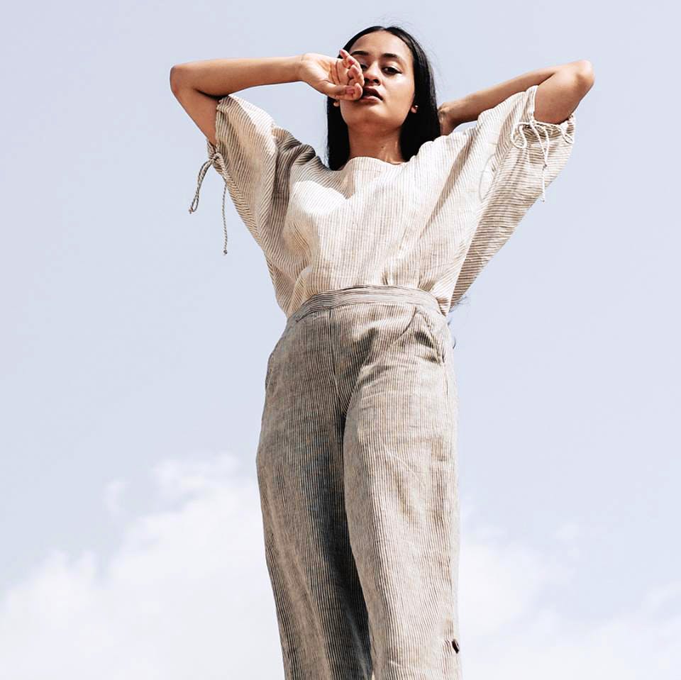 White,Clothing,Fashion model,Shoulder,Beauty,Leg,Arm,Standing,Jeans,Thigh