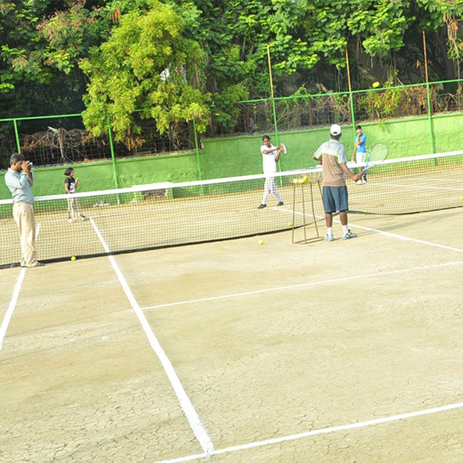 Tennis court,Sport venue,Tennis,Tennis player,Soft tennis,Tennis Equipment,Net,Sports,Racquet sport,Sports equipment