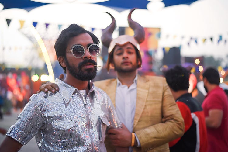 People,Eyewear,Event,Male,Facial hair,Gentleman,Moustache,Crowd,Glasses,Party