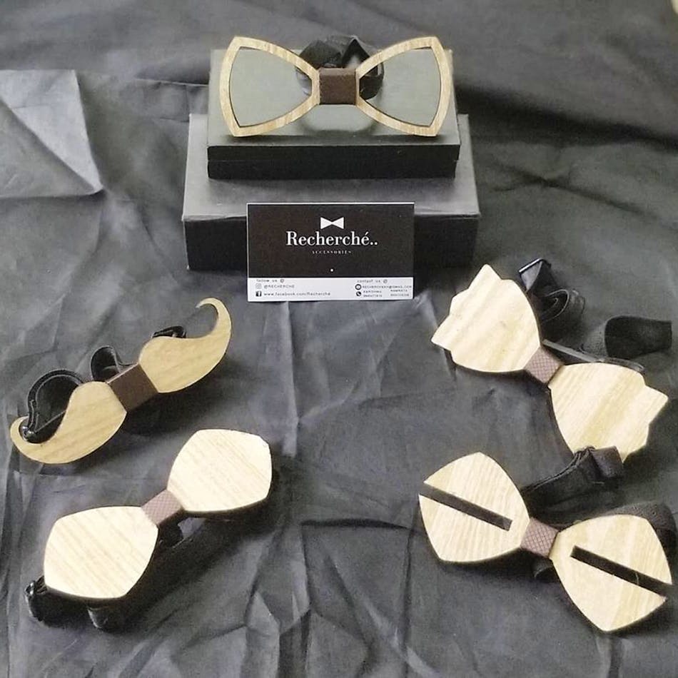 Eyewear,Glasses,Sunglasses,Bow tie,Tie,Fashion accessory,Personal protective equipment,Vision care