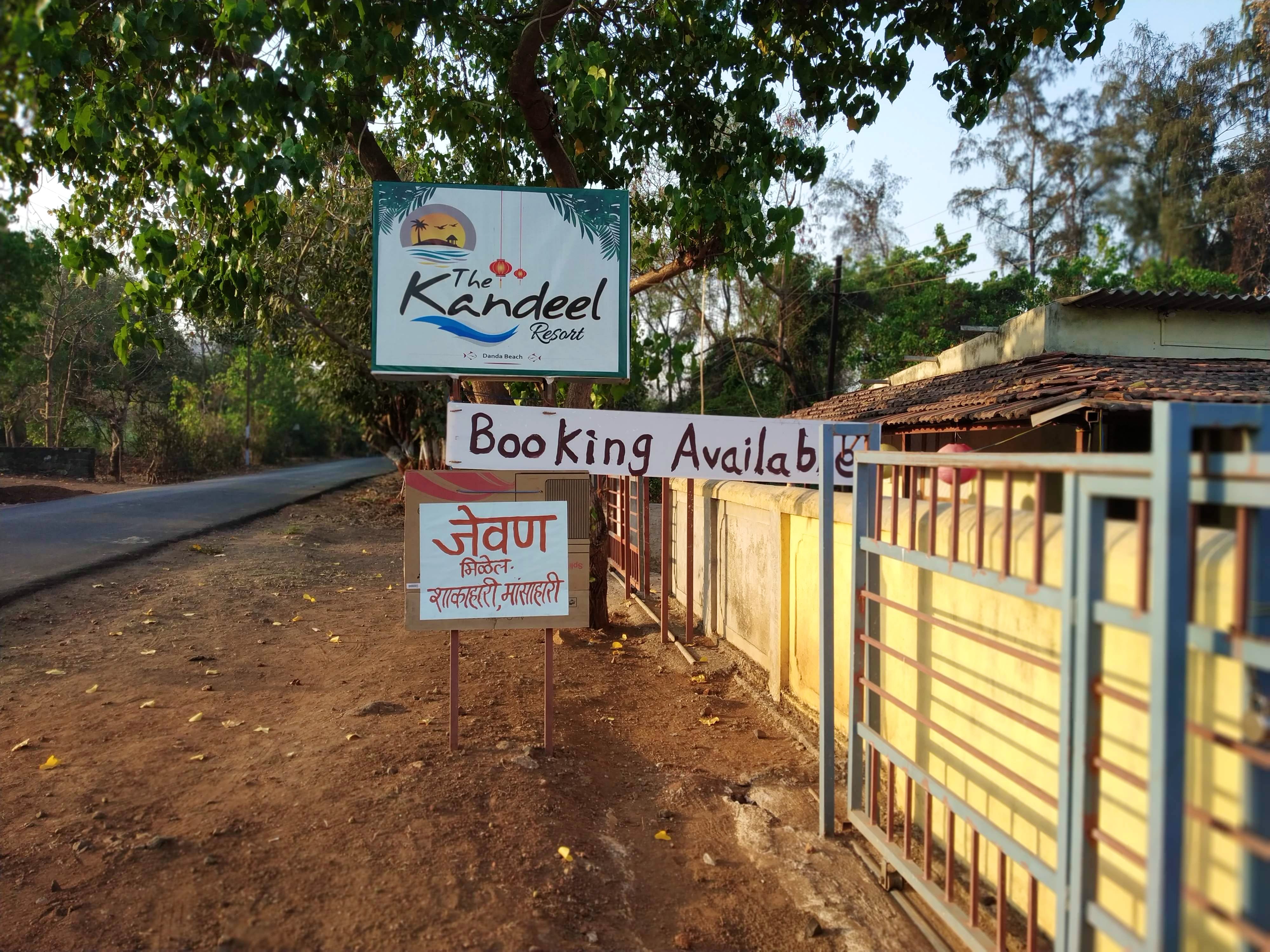 Transport,Tree,Signage,Road,Advertising,Font,Soil,Sign,Plant,Thoroughfare