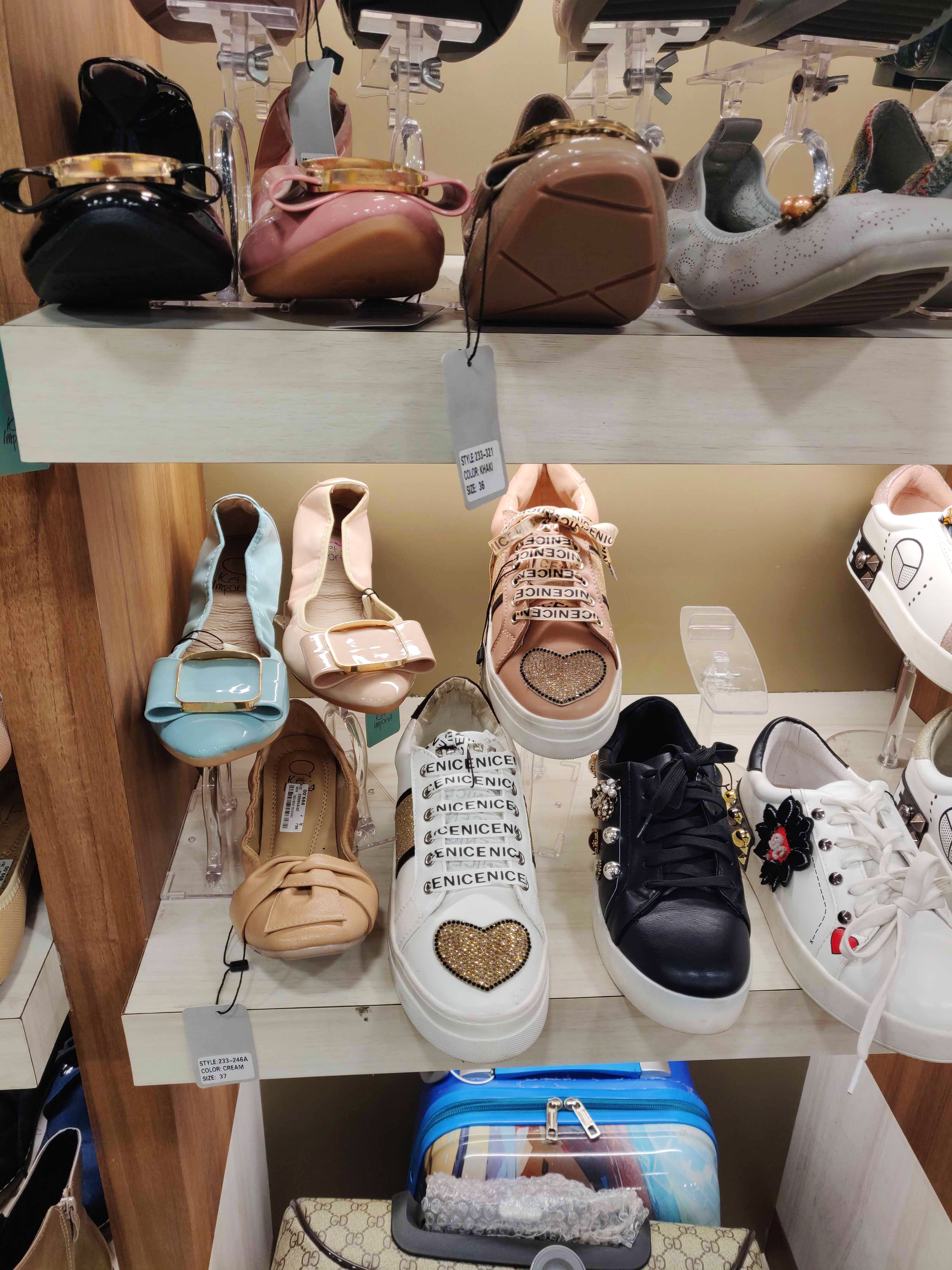 Footwear,Shoe,Shoe store,Collection,Athletic shoe,Room,Sneakers,Plimsoll shoe