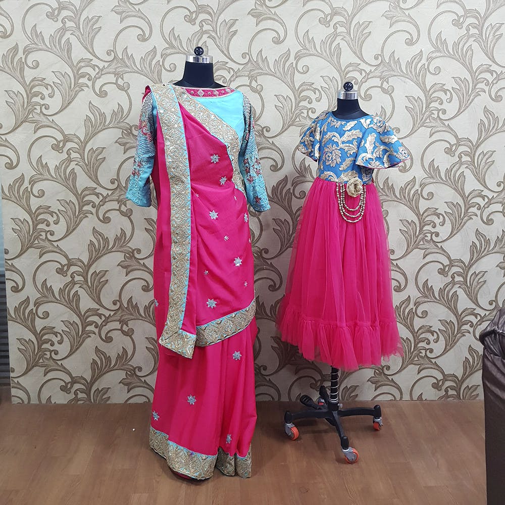 Clothing,Pink,Formal wear,Magenta,Turquoise,Dress,Aqua,Fashion design,Textile,Outerwear