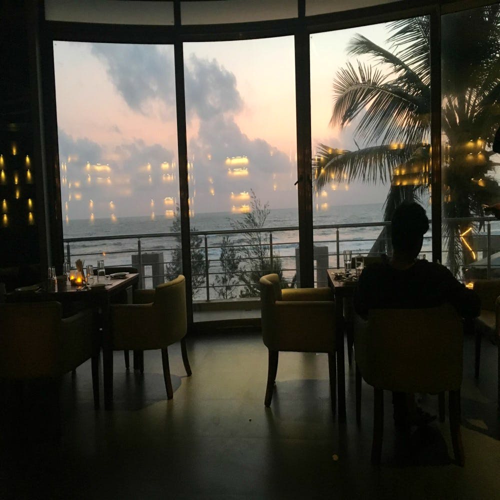 Sky,Restaurant,Evening,Water,Room,Window,Atmosphere,Architecture,Sea,Vacation