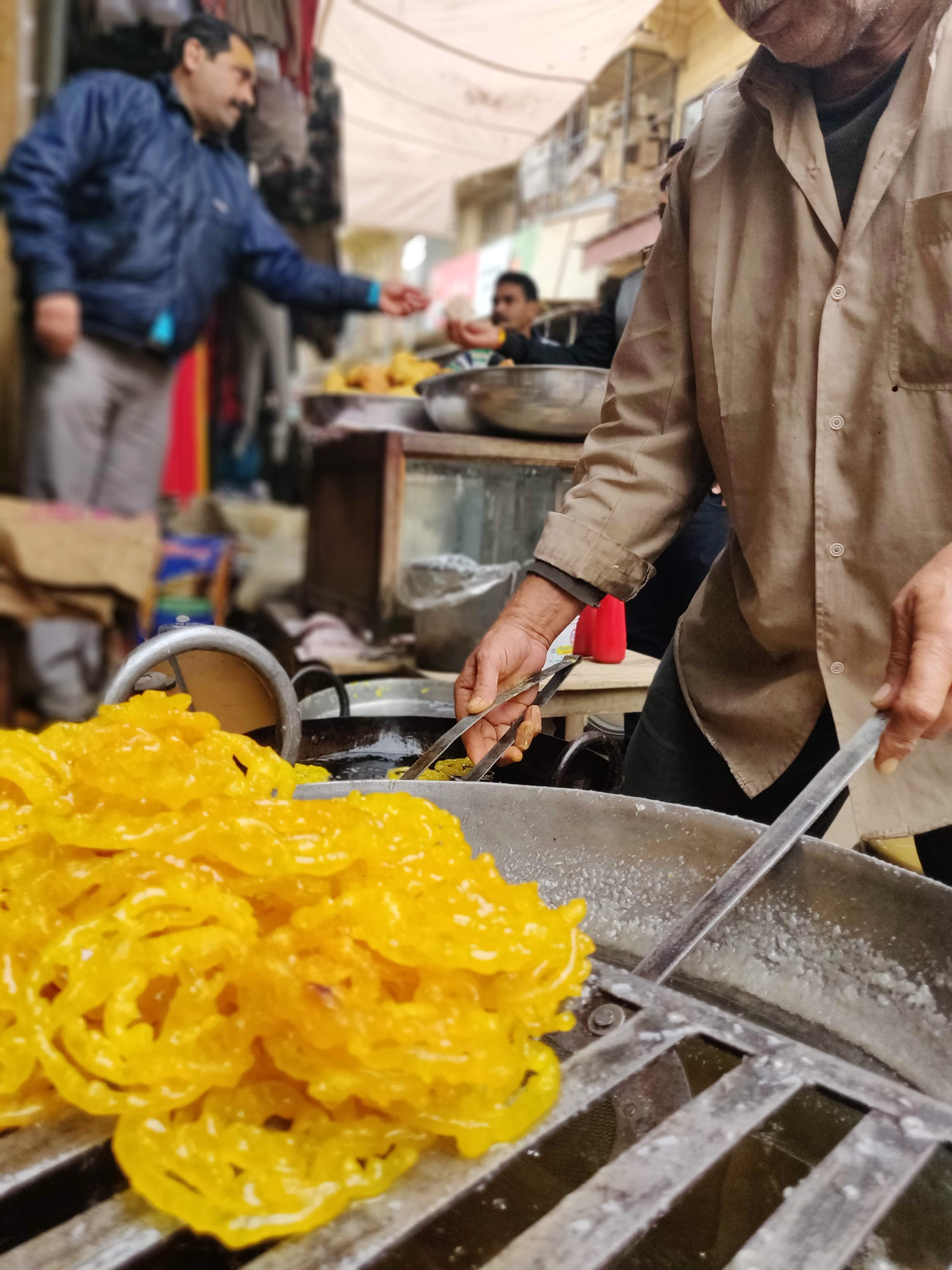 Food,Cuisine,Dish,Yellow,Street food,Jalebi,Junk food,Vegetarian food,Side dish,Confectionery