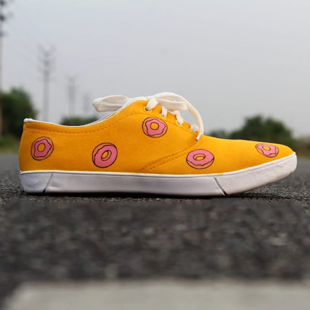 Footwear,Shoe,Yellow,Orange,Sneakers,Outdoor shoe,Walking shoe,Plimsoll shoe,Skate shoe,Athletic shoe