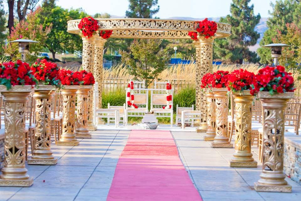 Decoration,Aisle,Arch,Floral design,Flower,Wedding reception,Ceremony,Flower Arranging,Floristry,Plant