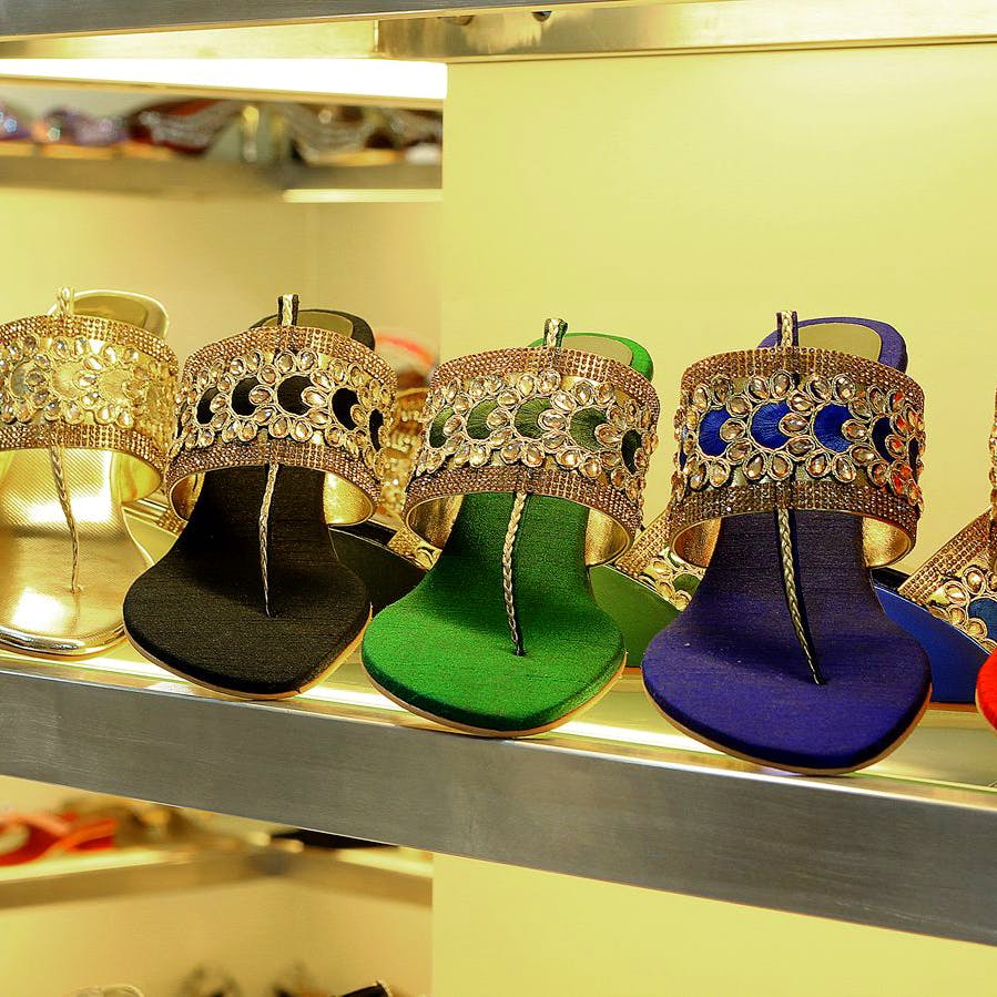 Footwear,Shoe,Fashion,High heels,Dress shoe,Sandal,Fashion accessory,Shoe store,Collection