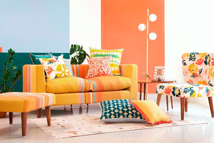 Furniture,Living room,Orange,Room,Yellow,Couch,Interior design,Turquoise,Table,Pink