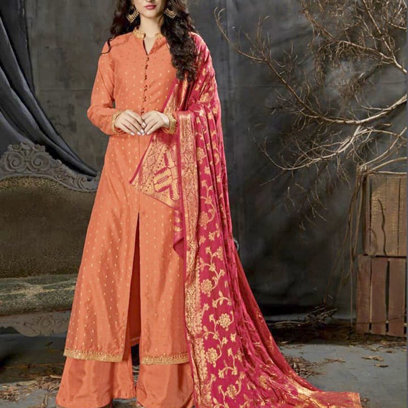 Clothing,Formal wear,Fashion model,Orange,Peach,Dress,Sari,Maroon,Brown,Gown