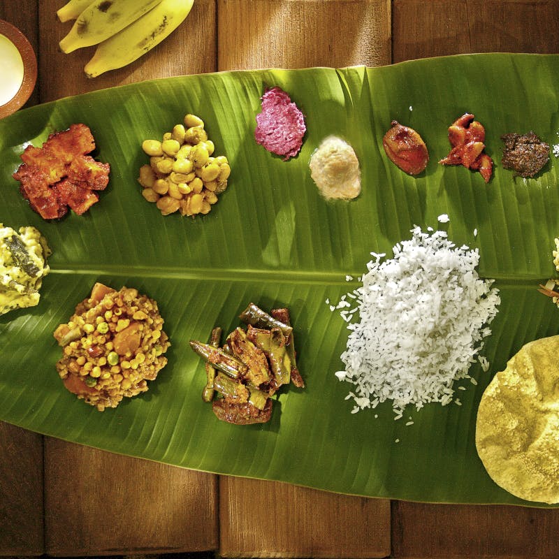 Sadya,Banana leaf,Banana leaf rice,Leaf,Food,Dish,Suman,Cuisine,Andhra food,Vegetarian food