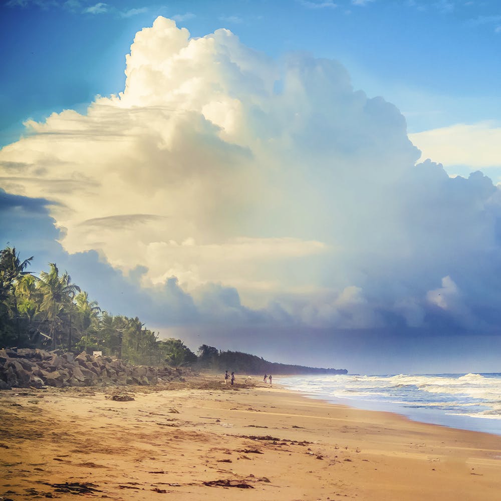 Sky,Cloud,Body of water,Beach,Nature,Sea,Ocean,Shore,Tropics,Coast