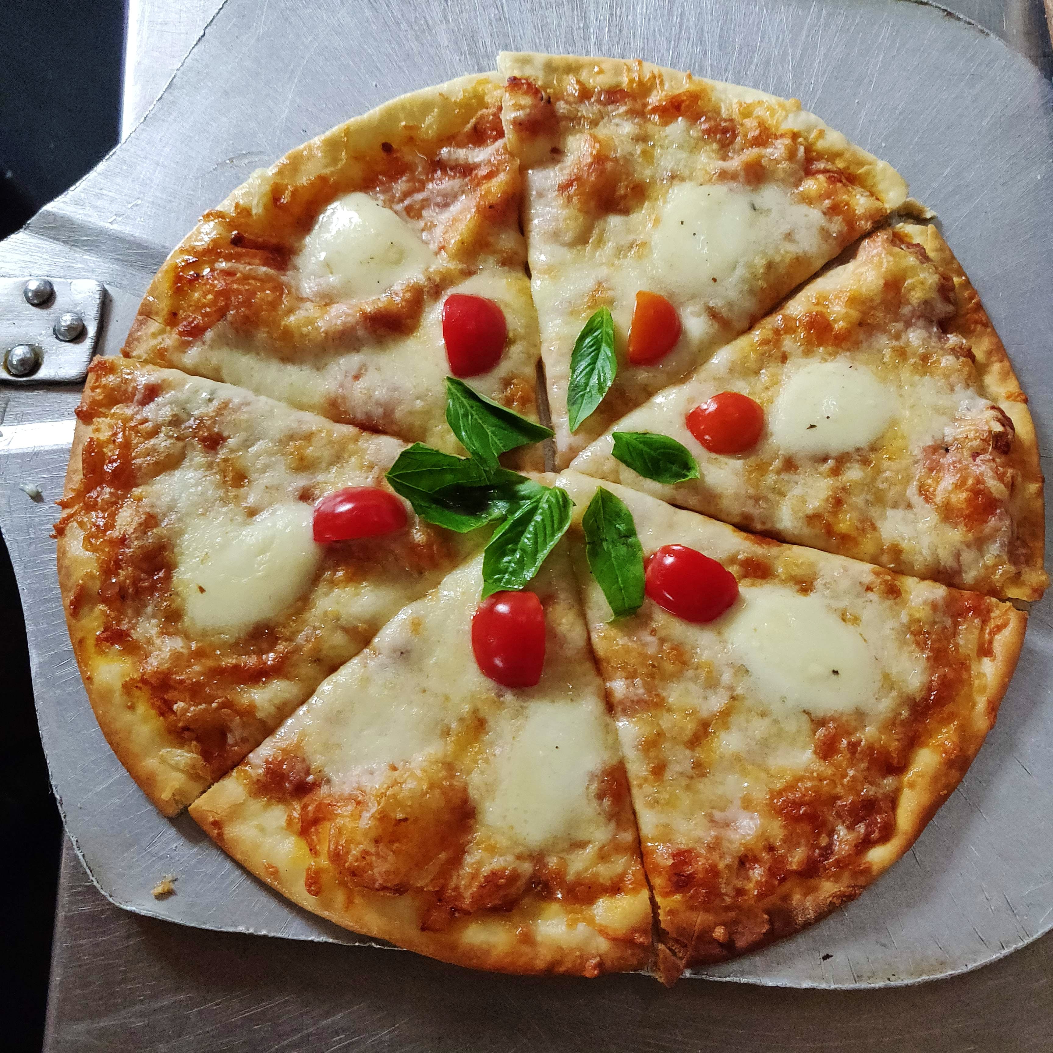 Dish,Food,Cuisine,Pizza,Ingredient,Flatbread,Pizza cheese,Produce,Recipe,Staple food