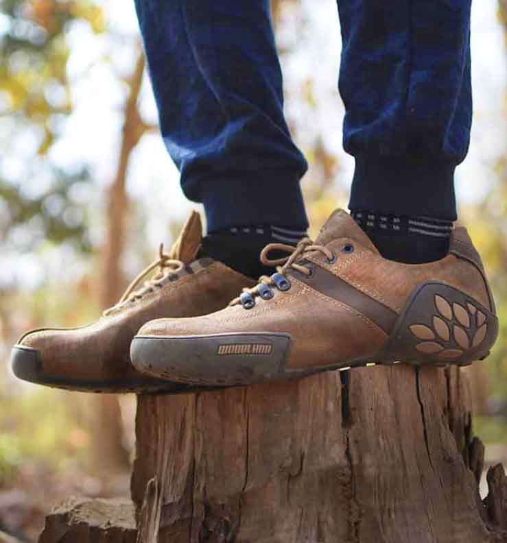 Shoe,Footwear,Brown,Outdoor shoe,Hiking boot,Tree,Boot,Jeans,Durango boot