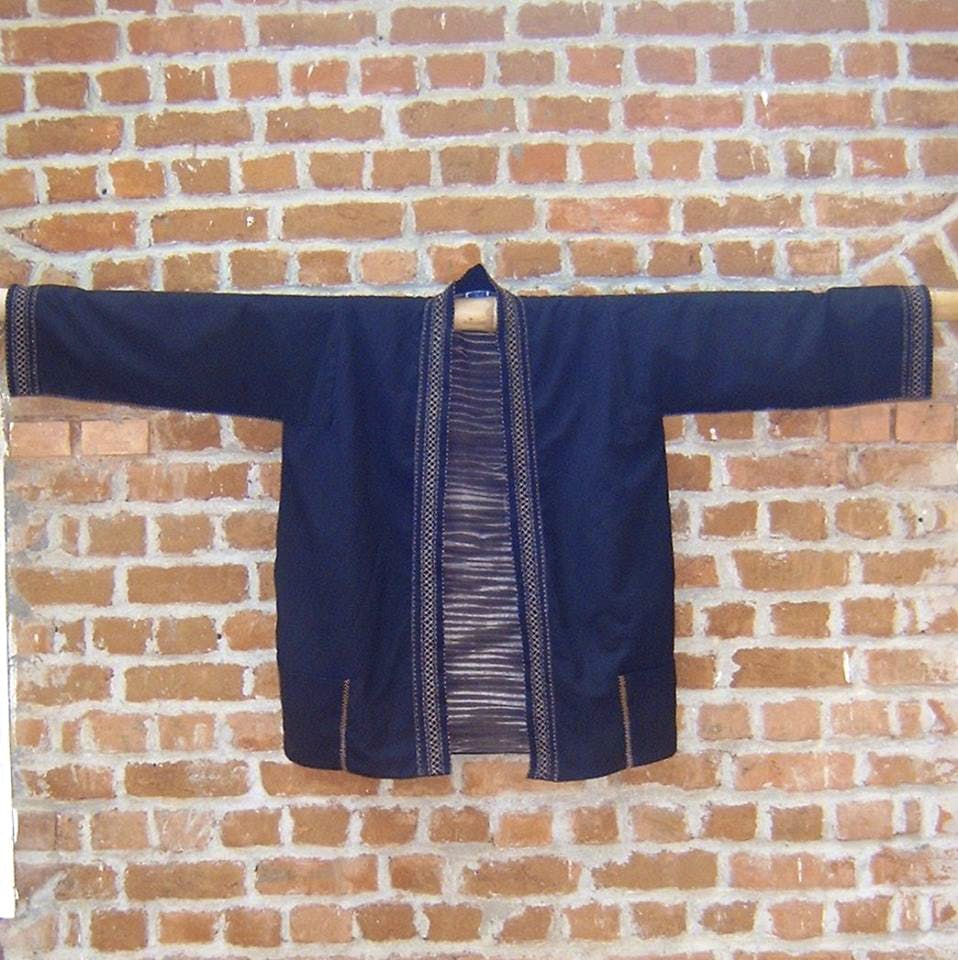 Clothing,Denim,Textile,Jacket,Jeans,Outerwear,Sleeve,Brickwork,Brick