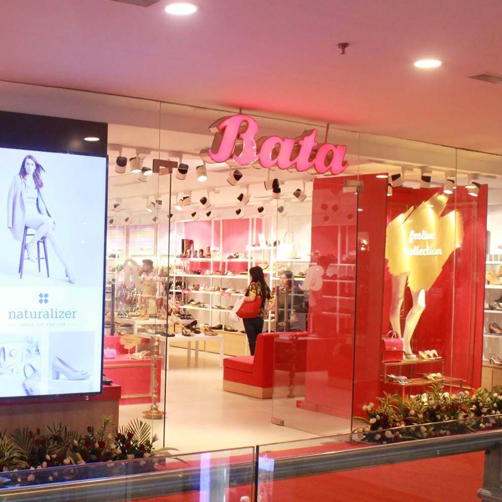 Boutique,Pink,Outlet store,Building,Display window,Retail,Interior design,Footwear,Display case,Lingerie