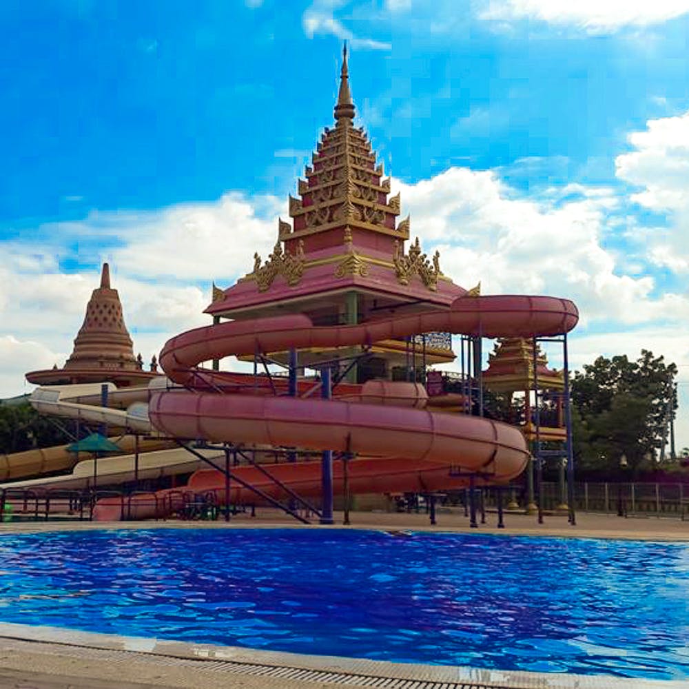 Landmark,Sky,Temple,Architecture,Place of worship,Building,Leisure,Swimming pool,Pagoda,Vacation