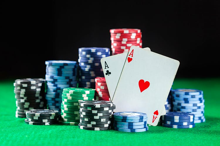Poker,Games,Gambling,Poker set,Casino,Card game,Recreation,Poker table