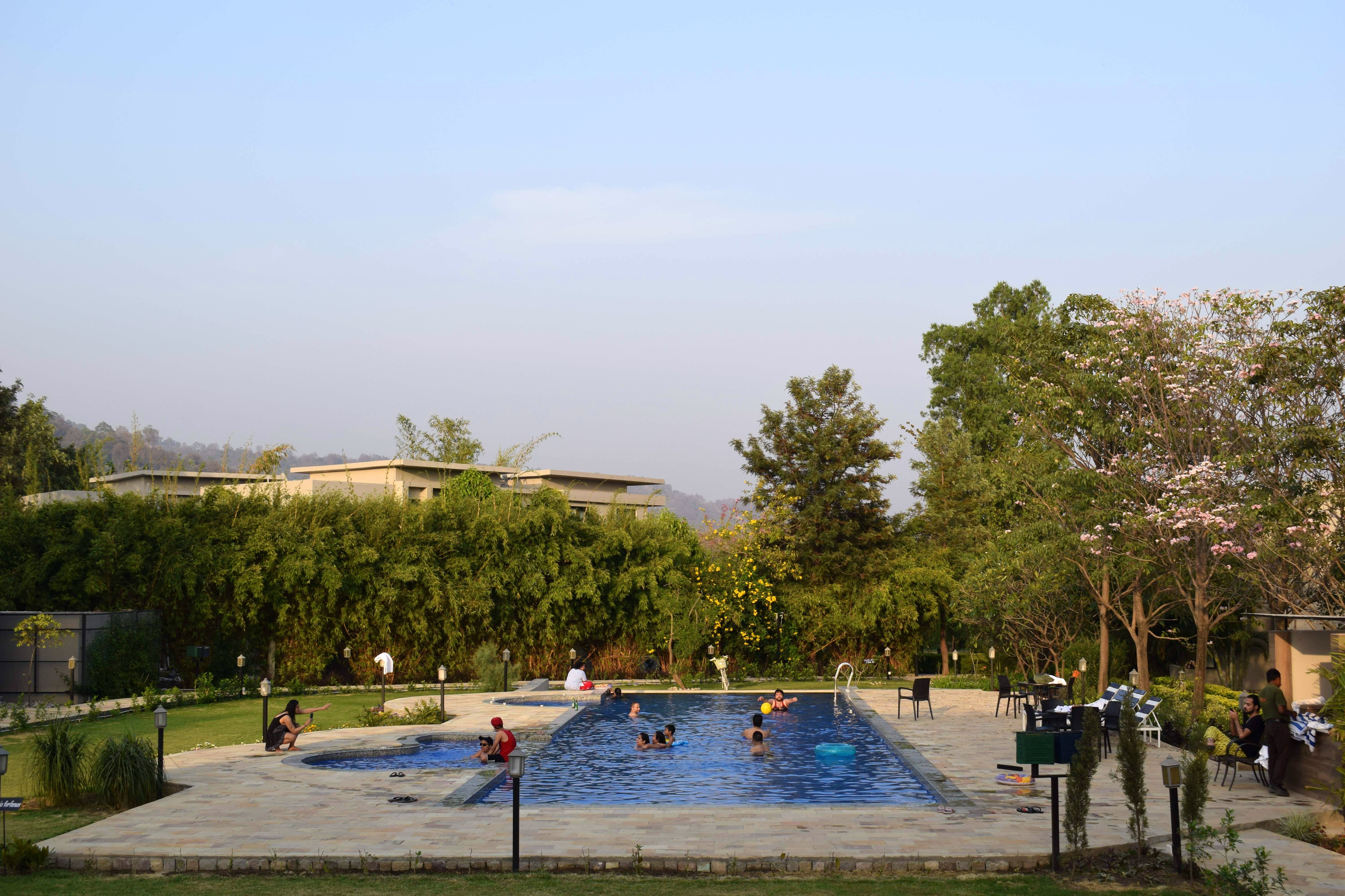 Tree,Leisure,Public space,Sky,Swimming pool,Architecture,Vacation,Park,Tourism,Recreation