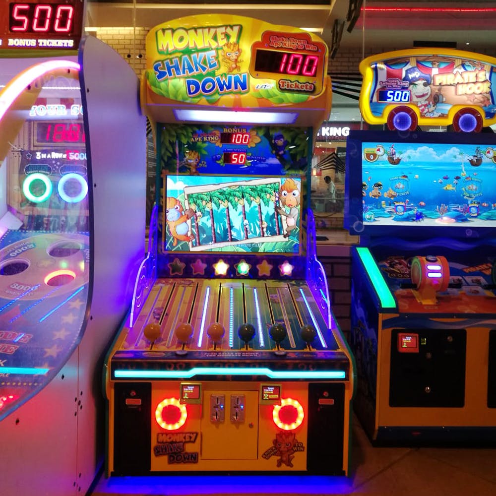 Games,Arcade game,Electronic device,Technology,Video game arcade cabinet,Recreation,Machine,Slot machine,Recreation room,Room