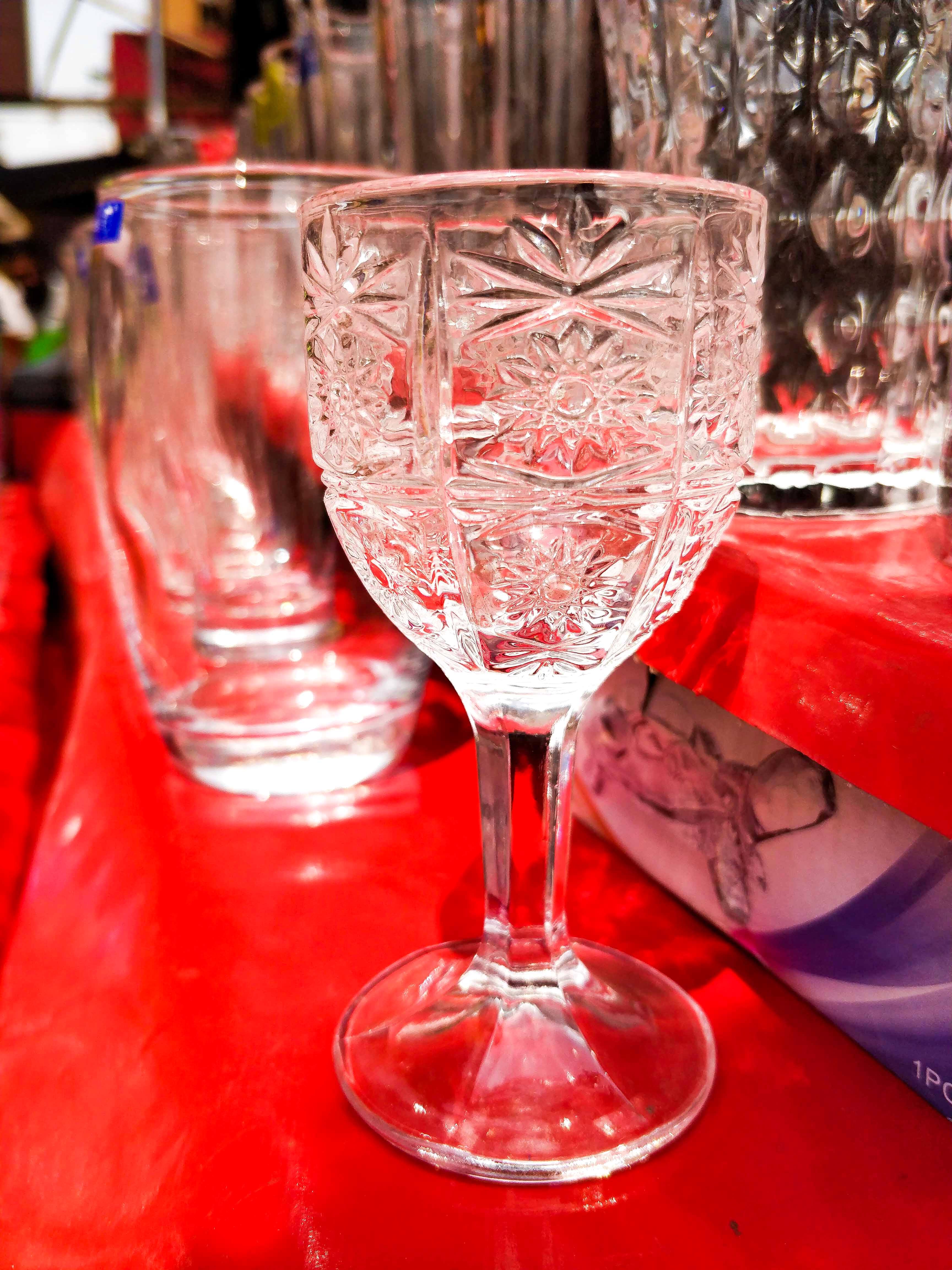 Stemware,Wine glass,Glass,Drinkware,Champagne stemware,Red,Drink,Tableware,Pink,Martini glass