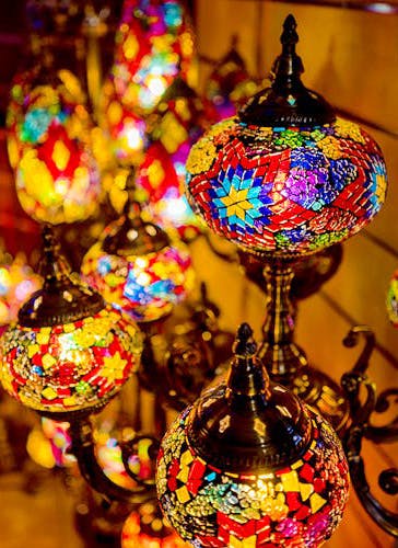 Lighting,Light fixture,Lamp,Lighting accessory,Tradition,Glass,Ornament,Interior design,Chandelier