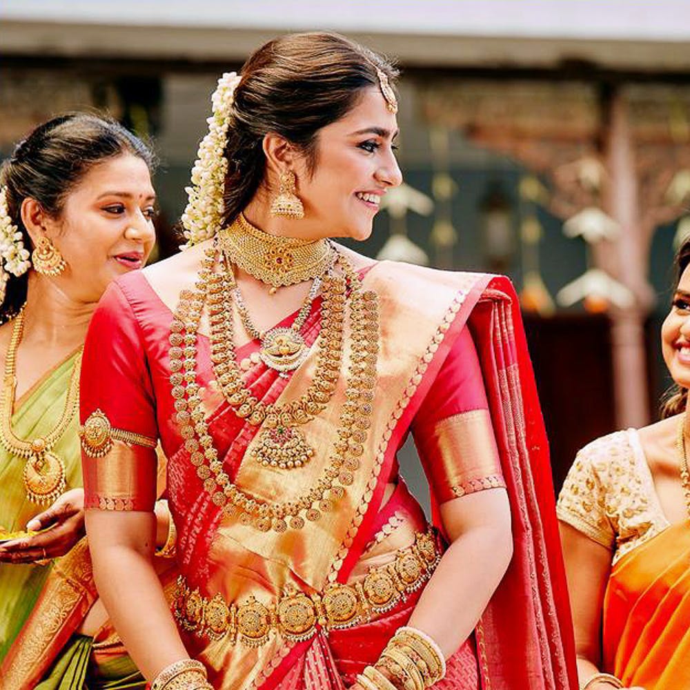 Sari,Jewellery,Tradition,Lady,Maroon,Yellow,Hairstyle,Orange,Peach,Event