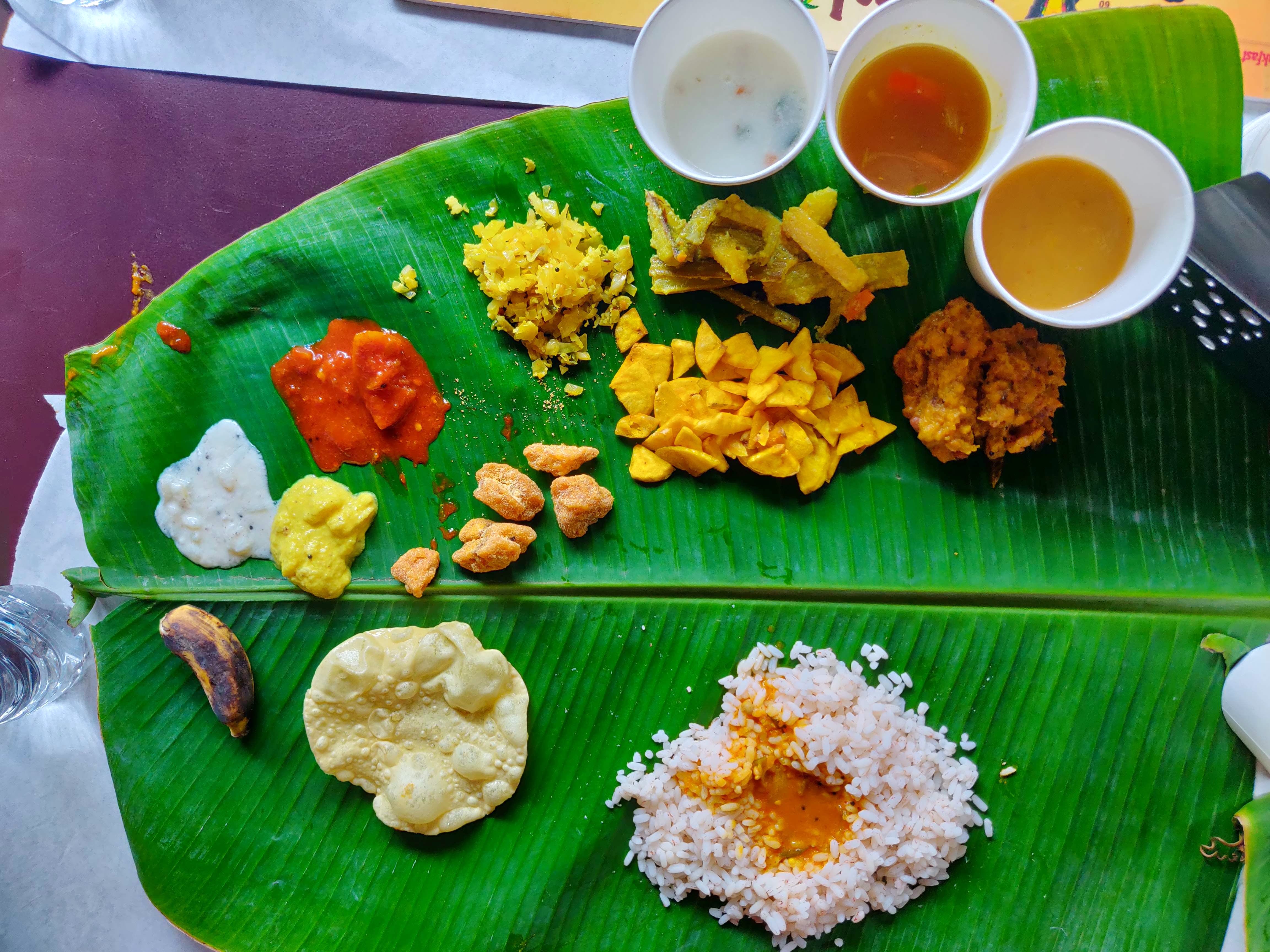 Dish,Food,Cuisine,Sadya,Banana leaf rice,Banana leaf,Ingredient,Andhra food,Tamil food,Steamed rice