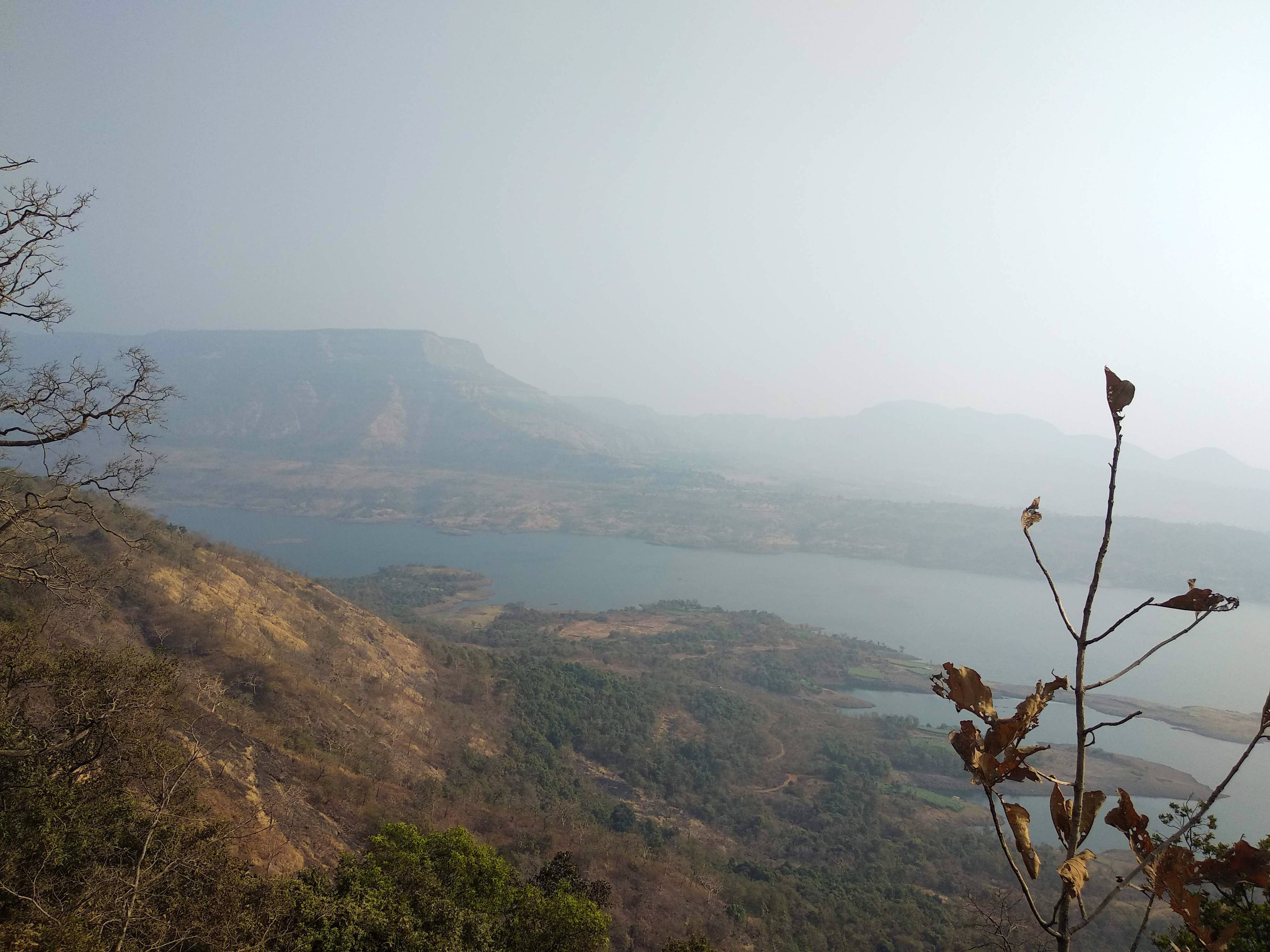 Sky,Mountainous landforms,Hill station,Atmospheric phenomenon,Mountain,Natural landscape,Fog,Hill,Cloud,Wilderness