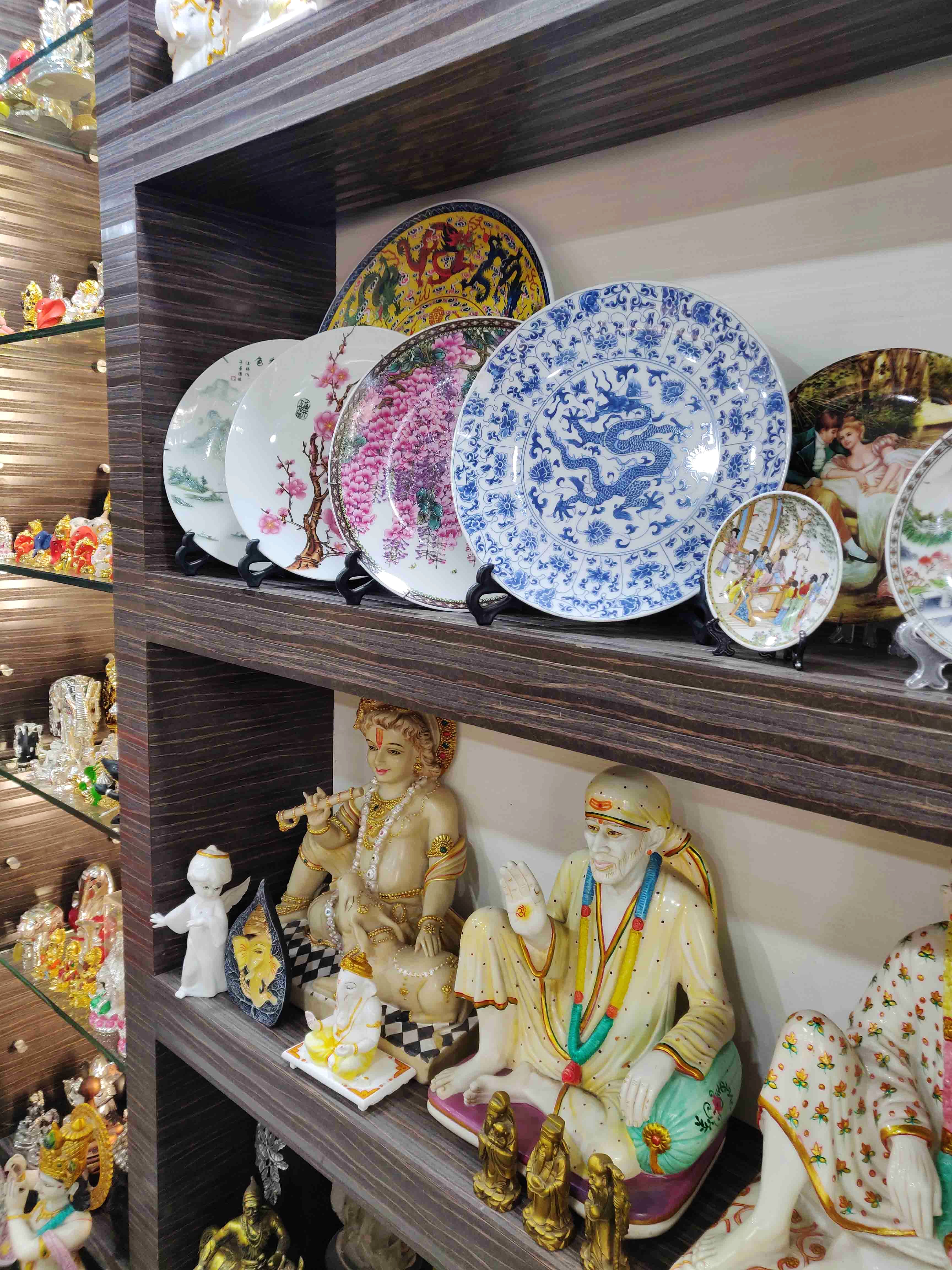 Shelf,Porcelain,Ceramic,Room,Collection,Souvenir,Tableware,Interior design,Dishware,Shelving