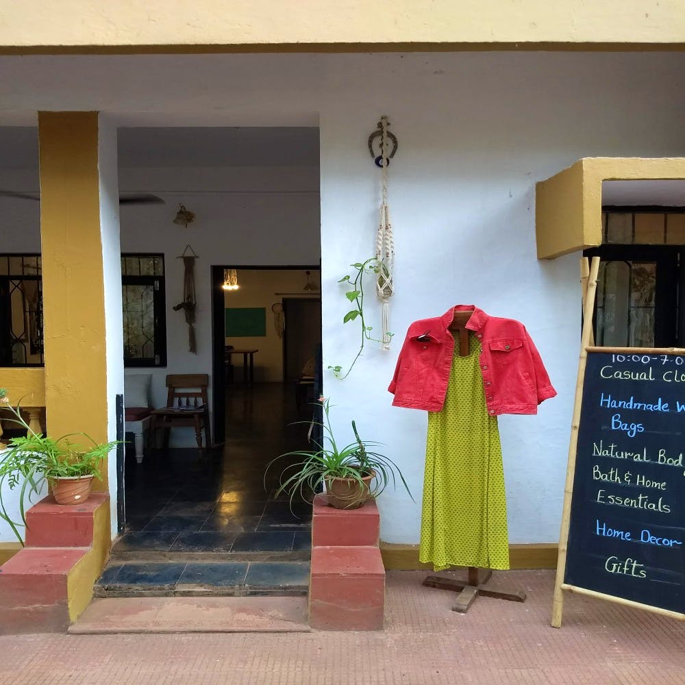 Yellow,Door,Pink,House,Outerwear,Home,Building,Room,Window,Plant