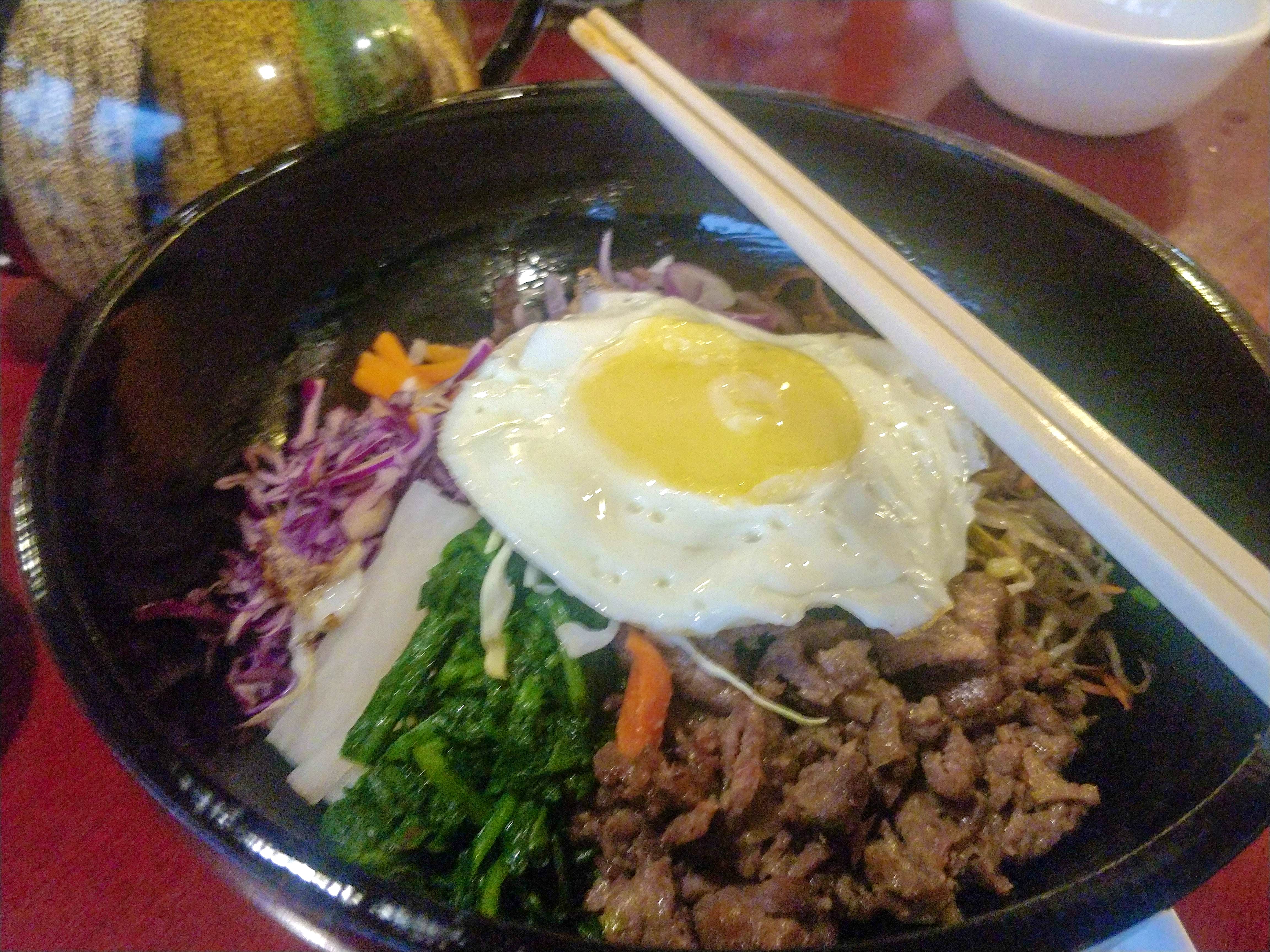 Dish,Food,Cuisine,Ingredient,Bibimbap,Steamed rice,Poached egg,Fried egg,Meat,Produce