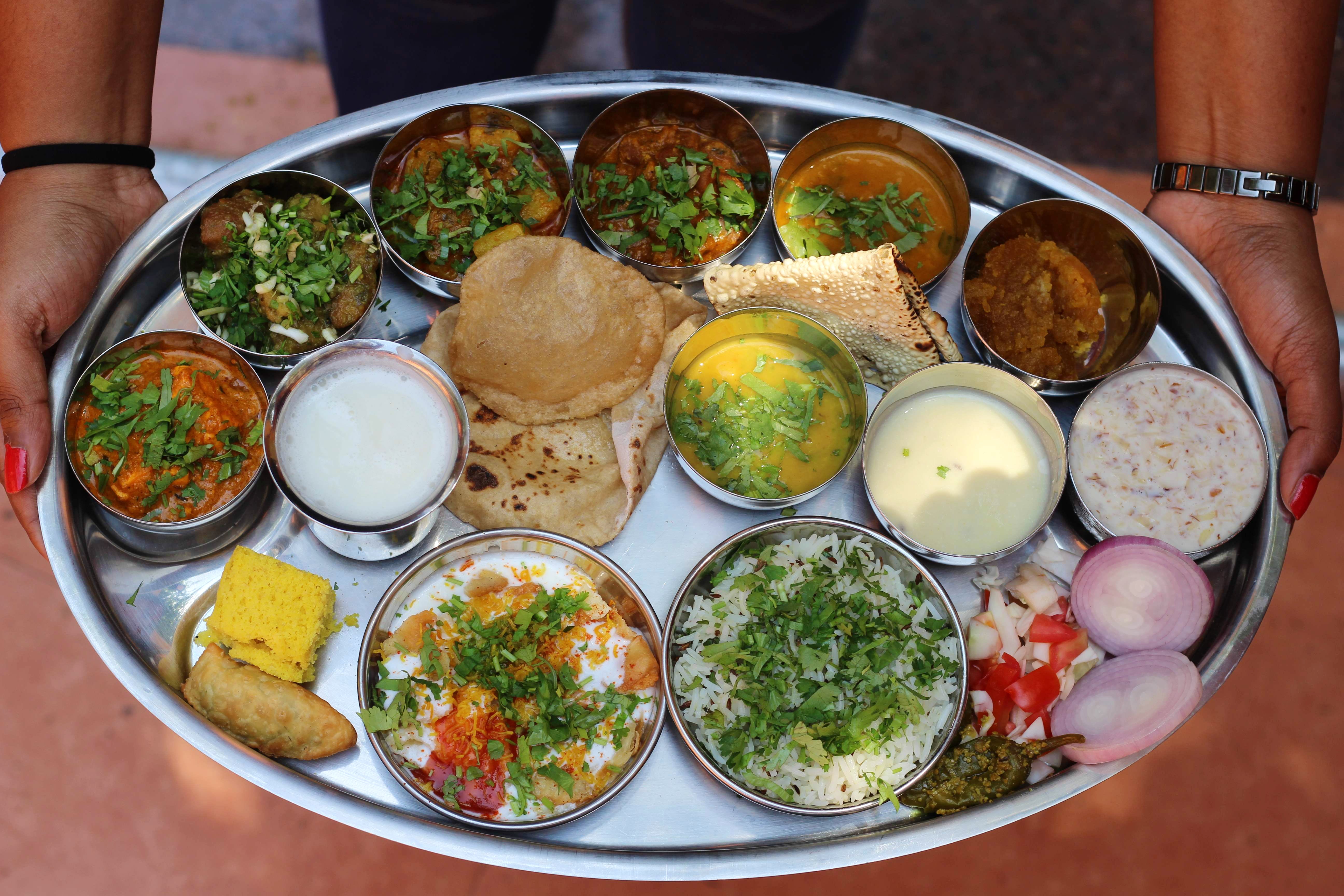 this-enormous-thali-includes-more-than-25-dishes-apart-from-the-two